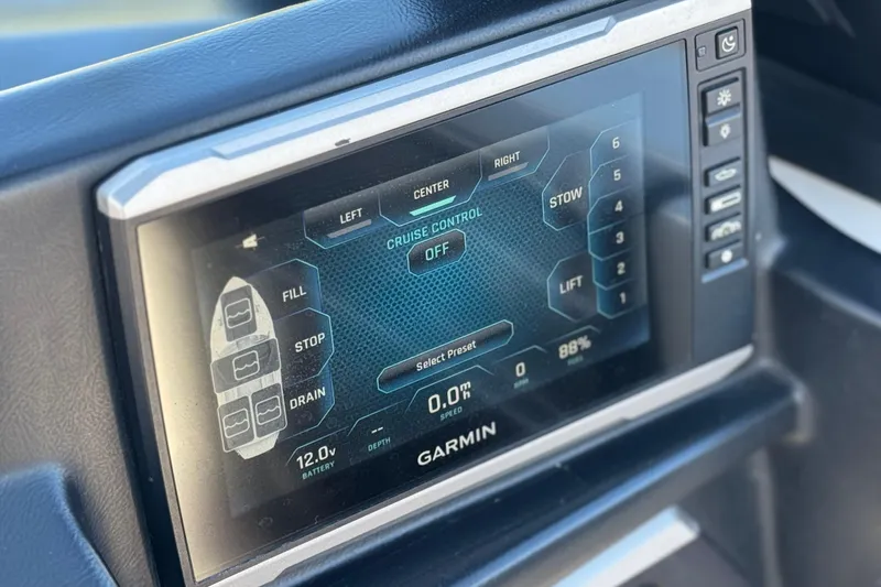 Slide: The Image of Touchscreen display in 2023 Axis T220 boat showing cruise control and ballast settings. - 36
