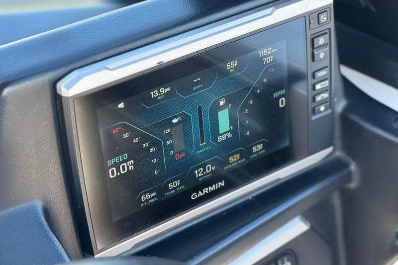 Slide: The Image of Dashboard display of 2023 Axis T220 showing speed, RPM, and fuel levels. - 37