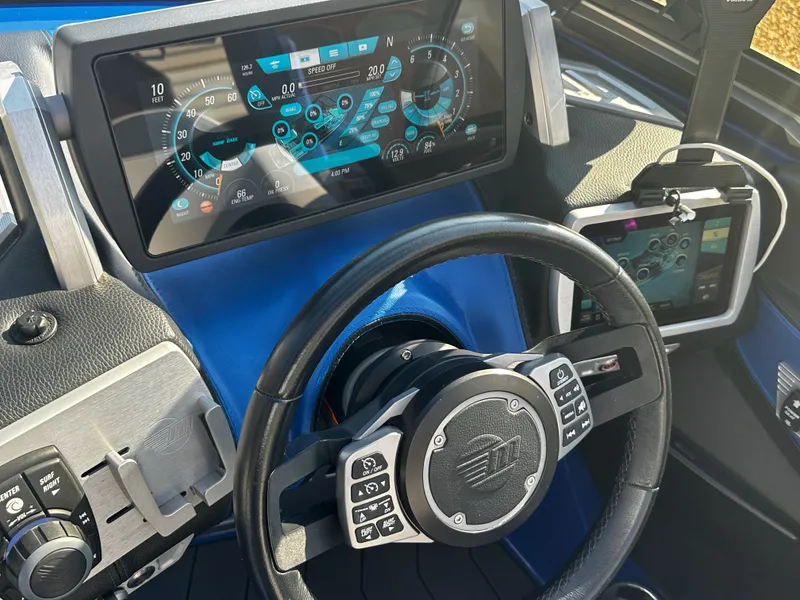 Slide: The Image of Dashboard of a 2017 Malibu M235 with modern displays. - 23