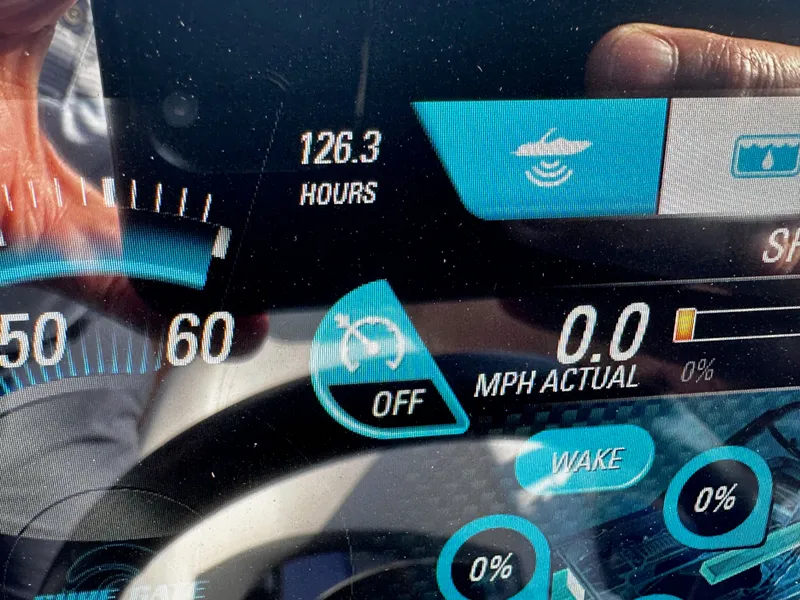 Slide: The Image of Malibu M235 2017 dashboard displaying 126.3 hours of operation. - 24