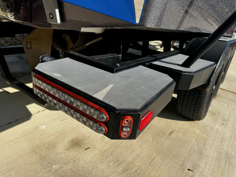 Slide: The Image of Rear view of a 2017 Malibu M235 boat trailer. - 42