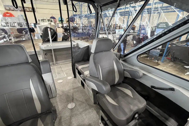 Slide: The Image of Interior of 2026 Hewescraft 190 Sea Runner ET, featuring modern seating and spacious design. - 16