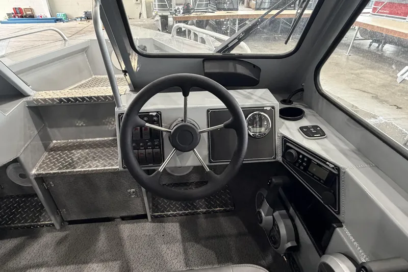 Slide: The Image of Interior view of 2026 Hewescraft 190 Sea Runner ET boat cockpit. - 18