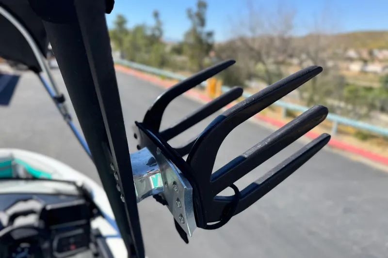 Slide: The Image of 2023 Axis T220 boat with a close-up of a wakeboard rack. - 17