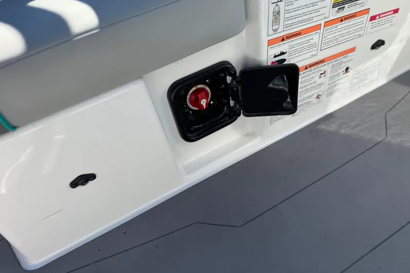Slide: The Image of 2023 Axis T220 boat battery switch with safety warnings and instructions. - 26