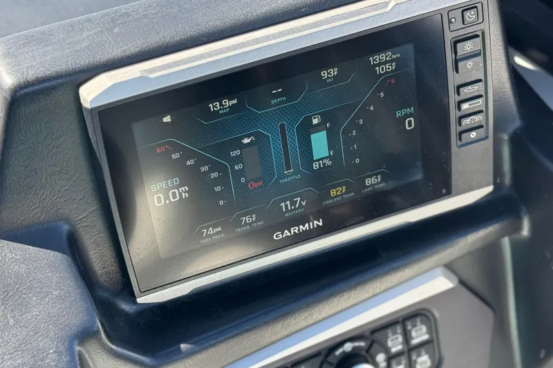 Slide: The Image of Dashboard display of a 2023 Axis T220 boat showing speed, RPM, and fuel levels. - 31