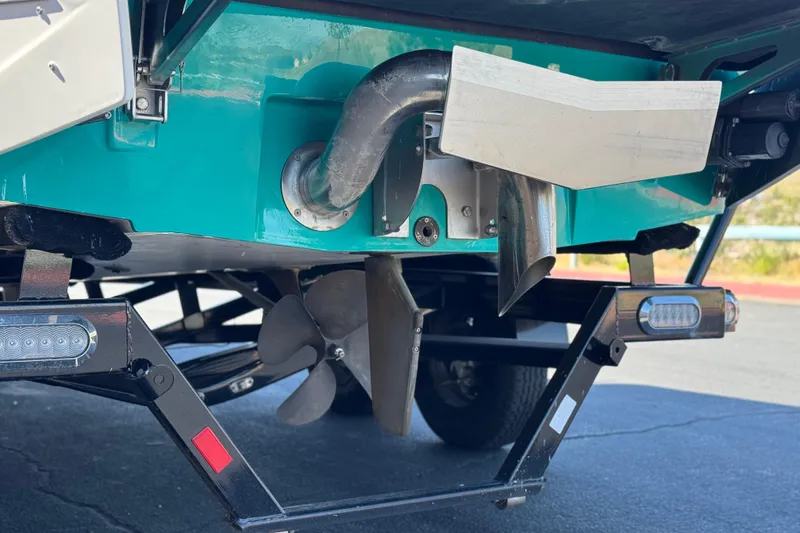 Slide: The Image of 2023 Axis T220 boat propeller and exhaust system on trailer. - 7