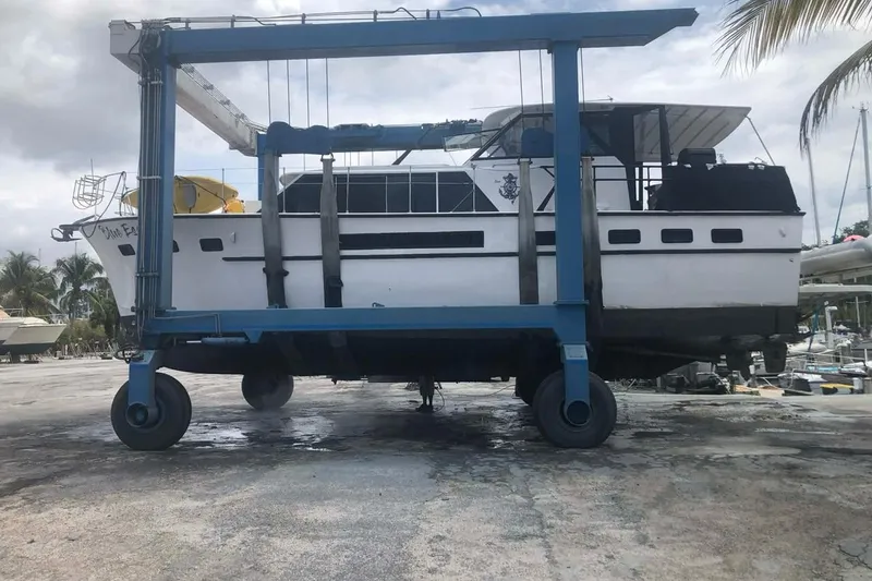 Slide: The Image of Shower area in 1967 Hatteras 44 Tri Cabin yacht with tiled walls and floor. - 19