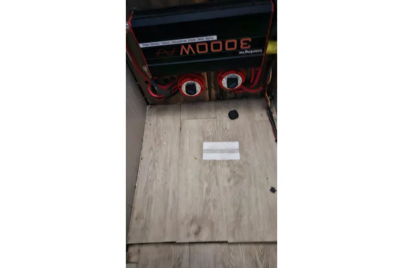 Slide: The Image of Electrical setup in a 1967 Hatteras boat with a 3000W inverter. - 25