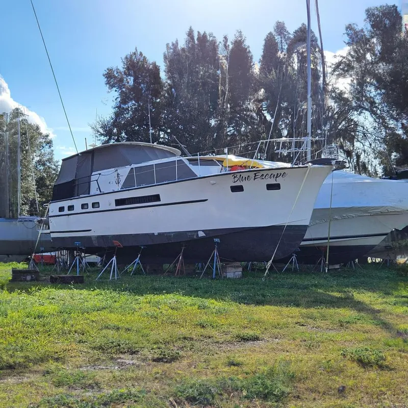 Slide: The Image of 1967 Hatteras boat helm with steering wheel, controls, and navigation equipment. - 4