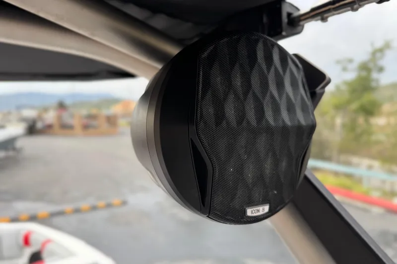Slide: The Image of Close-up of a speaker on a 2023 Malibu Wakesetter 21 LX boat. - 11