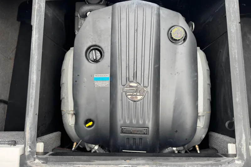 Slide: The Image of 2023 Malibu Wakesetter 21 LX engine compartment with Monsoon engine cover. - 23