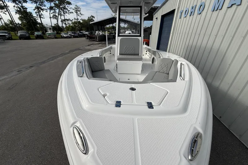 Slide: The Image of 2026 Blazer Bay Makaira 2600 boat with sleek white deck and seating. - 10