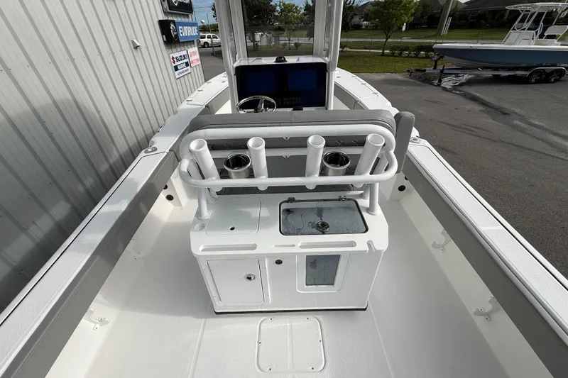 Slide: The Image of 2026 Blazer Bay Makaira 2600 boat interior with rod holders and control panel. - 13