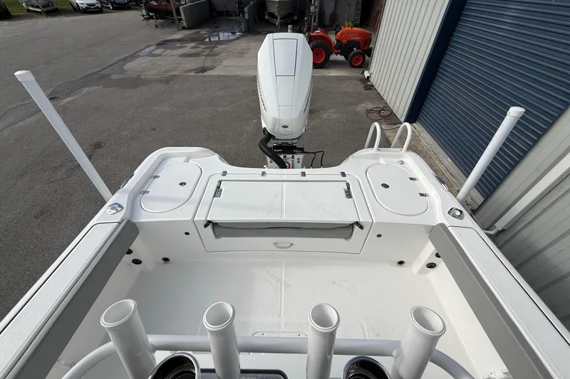 Slide: The Image of 2026 Blazer Bay Makaira 2600 boat deck with motor and storage compartments. - 17
