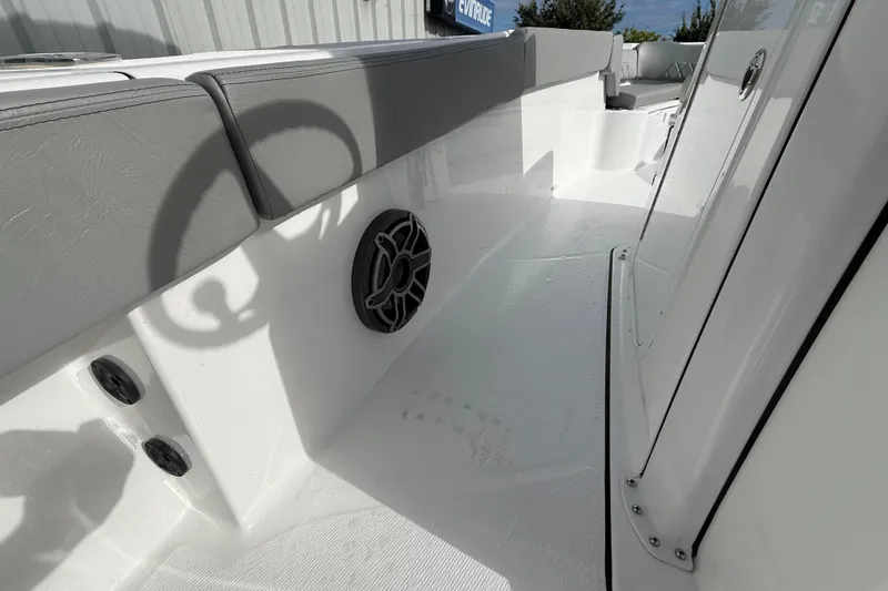 Slide: The Image of 2026 Blazer Bay Makaira 2600 boat interior with speaker and seating detail. - 30