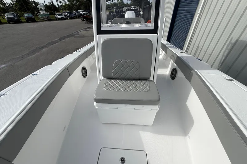 Slide: The Image of 2026 Blazer Bay Makaira 2600 boat interior with cushioned seating and sleek design. - 33