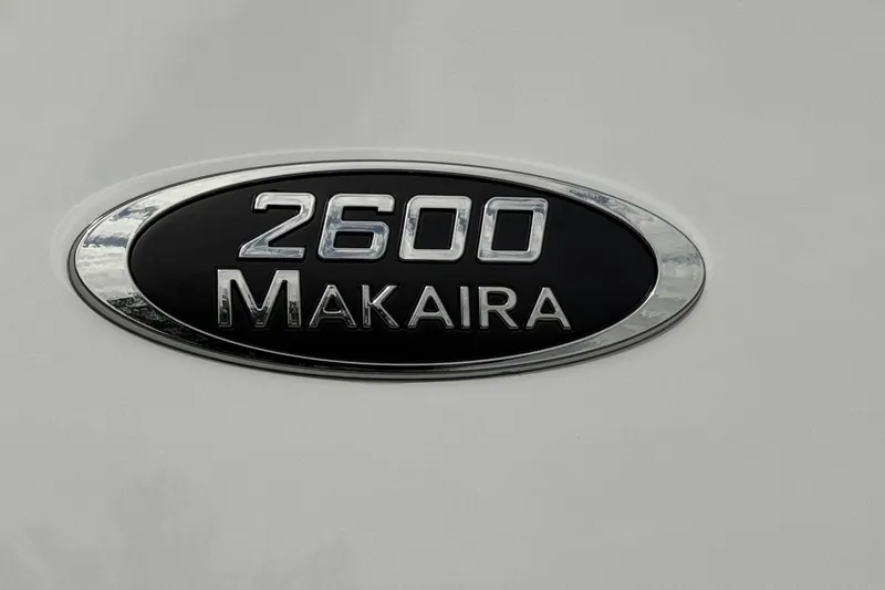 Slide: The Image of 2026 Blazer Bay Makaira 2600 emblem on a sleek surface. - 5