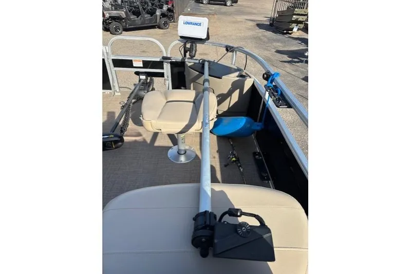 Slide: The Image of 2021 Sun Tracker Bass Buggy 18 DLX interior with fishing gear and Lowrance equipment. - 64