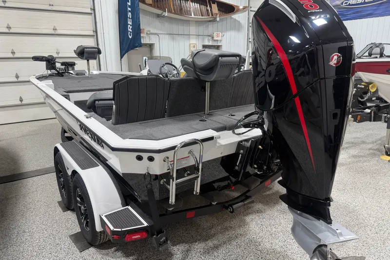 Slide: The Image of 2026 Vexus AVX 2085S boat with powerful outboard motor in showroom. - 1