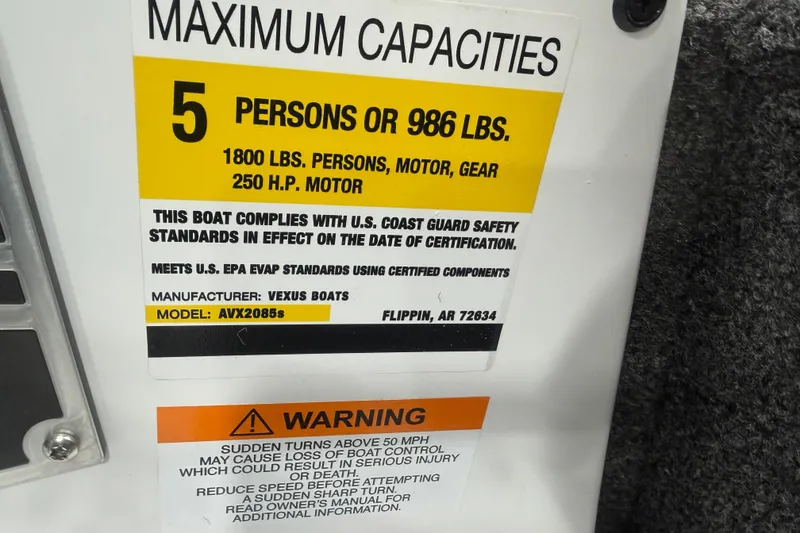 Slide: The Image of Vexus AVX 2085S 2026 boat capacity label, 5 persons or 986 lbs, safety compliance. - 15