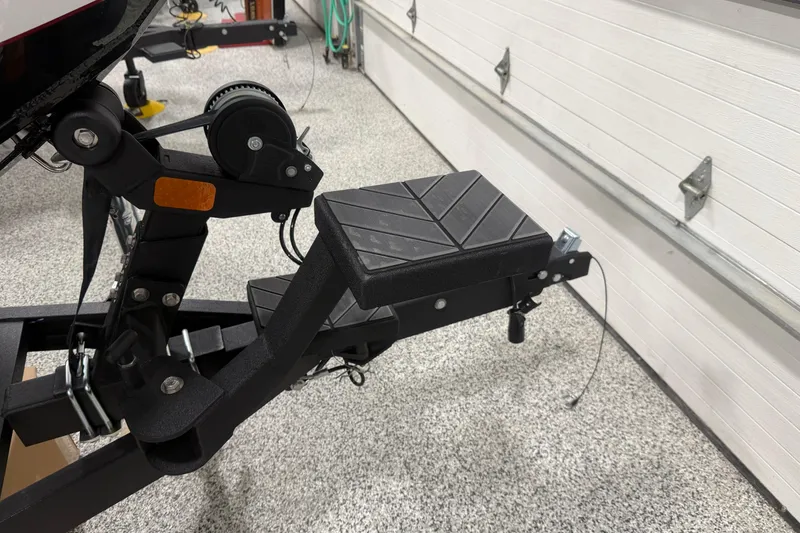 Slide: The Image of 2026 Vexus AVX 2085S boat trailer step in a garage setting. - 4