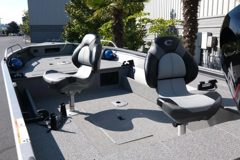 Slide: The Image of 2024 Crestliner 1650 Discovery Tiller boat interior with two swivel seats. - 7