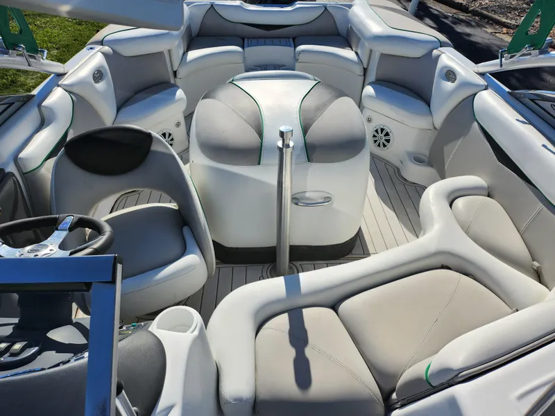 Slide: The Image of 2007 Tigé 22i boat interior with plush seating and modern design. - 19