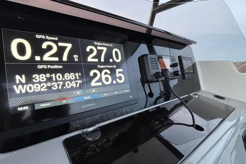 Slide: The Image of Dashboard of 2022 Jeanneau Leader 9.0 CC with GPS and engine data display. - 31