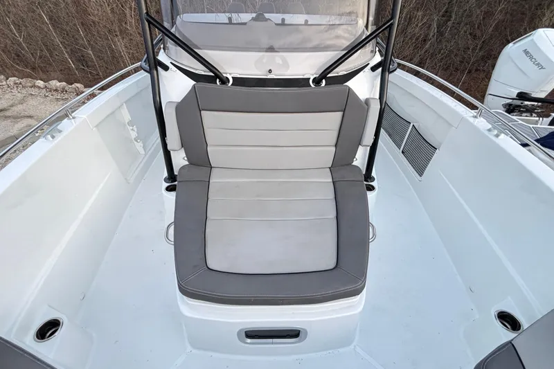 Slide: The Image of 2022 Jeanneau Leader 9.0 CC boat interior with cushioned seating and modern design. - 35