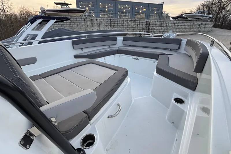 Slide: The Image of 2022 Jeanneau Leader 9.0 CC boat interior with cushioned seating and modern design. - 38