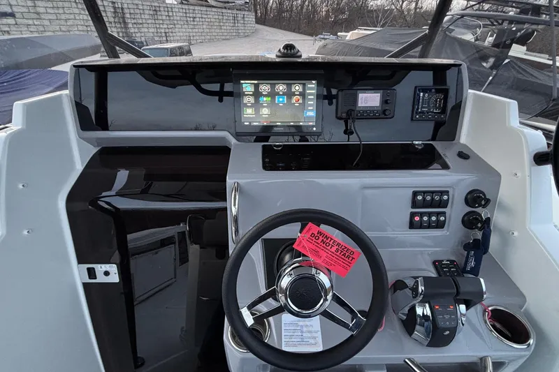 Slide: The Image of Cockpit of 2022 Jeanneau Leader 9.0 CC with modern controls and navigation display. - 41