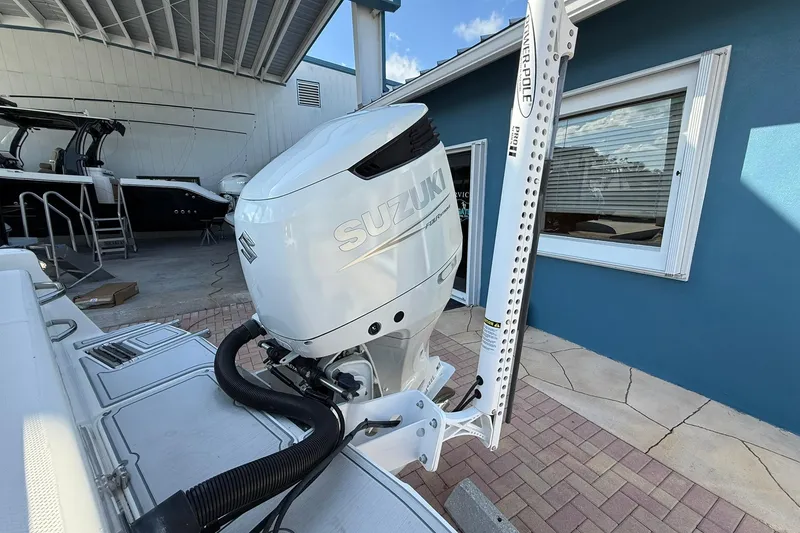 Slide: The Image of 2022 Sea Born LX24 Center Console with Suzuki outboard motor and Power-Pole anchor system. - 10
