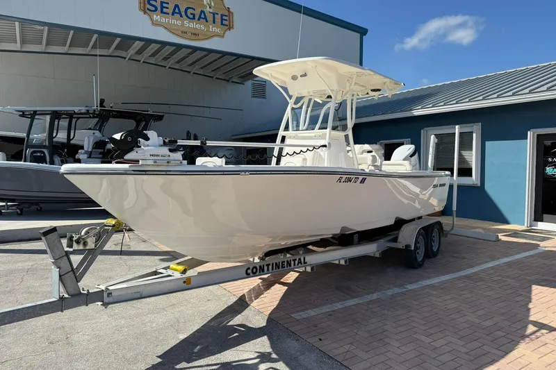 Slide: The Image of 2022 Sea Born LX24 Center Console boat on trailer at Seagate Marine Sales. - 2
