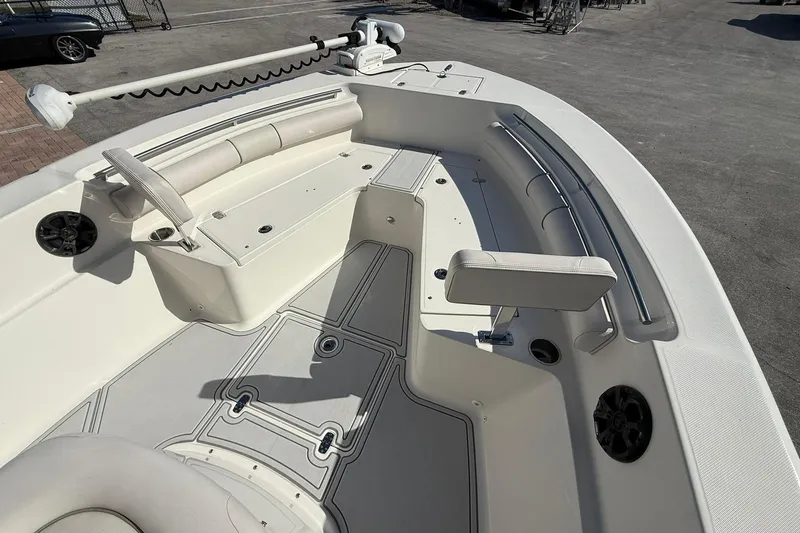 Slide: The Image of 2022 Sea Born LX24 Center Console boat interior with seating and storage compartments. - 21