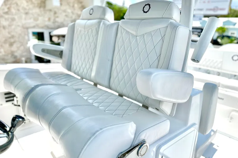 Slide: The Image of 2023 Fountain 38 Center Console boat with luxurious white leather seating. - 12