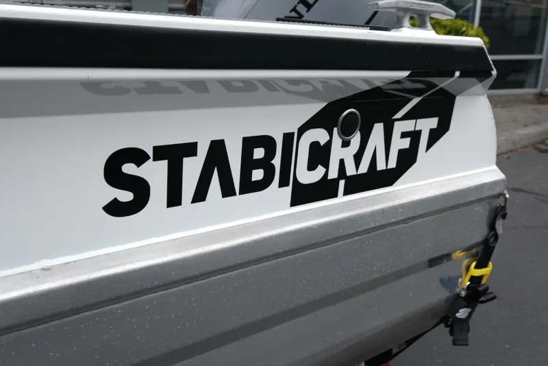 Slide: The Image of 2019 Stabicraft 1550 Fisher boat logo on hull, close-up view. - 6