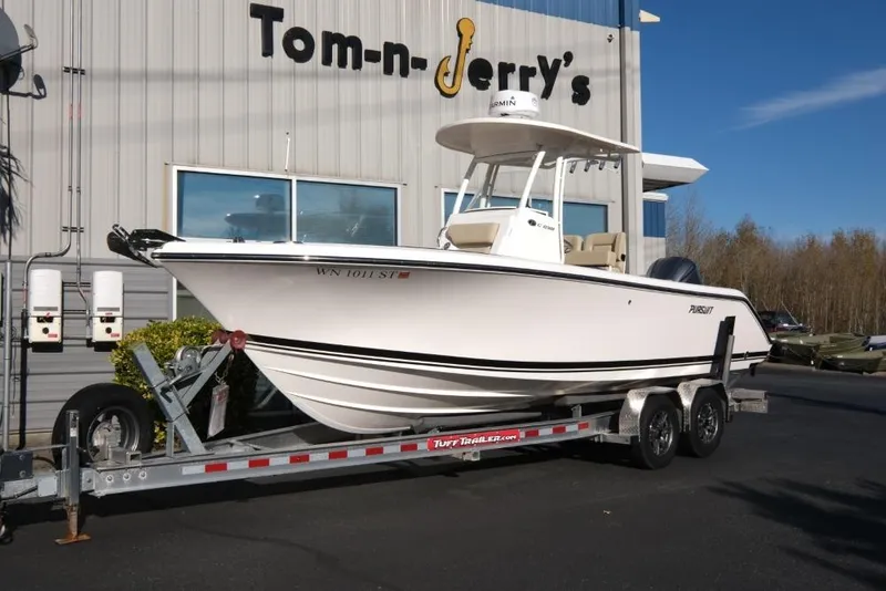 The Image of 2017 Pursuit C 238 Center Console boat on trailer outside Tom-n-Jerry's. - 1