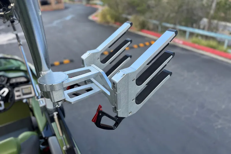 Slide: The Image of 2023 MasterCraft NXT22 boat with a sleek metal wakeboard rack. - 11