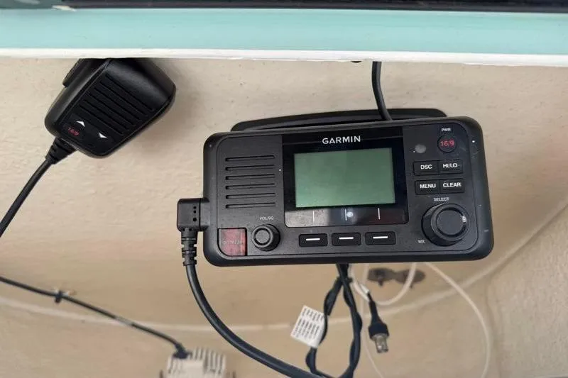 Slide: The Image of Garmin marine radio installed on 2024 Key West 210 Bay Reef boat. - 26