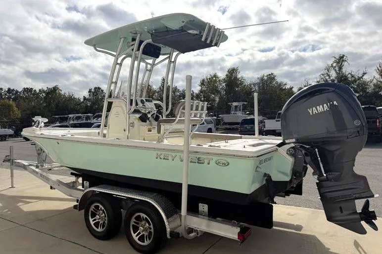 Slide: The Image of 2024 Key West 210 Bay Reef boat on trailer with Yamaha outboard motor. - 5