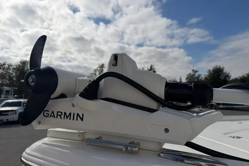 Slide: The Image of Garmin marine equipment on 2024 Key West 210 Bay Reef boat under cloudy sky. - 8