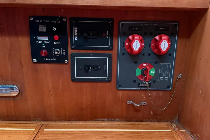 Slide: The Image of Control panel of a 2003 Sabre 362 boat with bilge pump monitor and switches. - 17