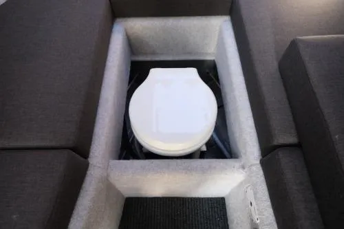 Slide: The Image of 2023 Makaira Sportfish 800 boat interior with hidden toilet feature. - 20