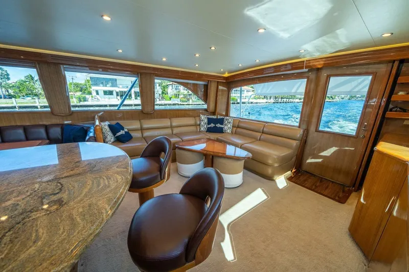 Slide: The Image of Luxurious interior of 2006 Viking 68 Convertible yacht with leather seating and ocean view. - 17