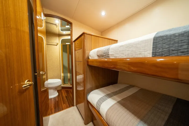 Slide: The Image of Interior of 2006 Viking 68 Convertible yacht with bunk beds and bathroom. - 45
