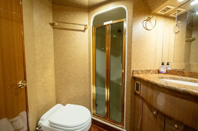 Slide: The Image of Luxurious bathroom in 2006 Viking 68 Convertible yacht with shower and elegant fixtures. - 46