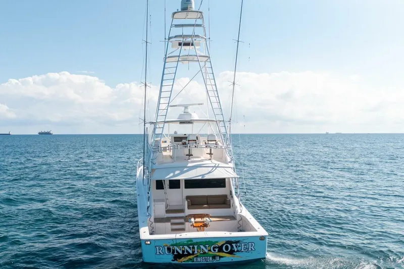 Slide: The Image of 2006 Viking 68 Convertible yacht on open sea, rear view, clear sky. - 5