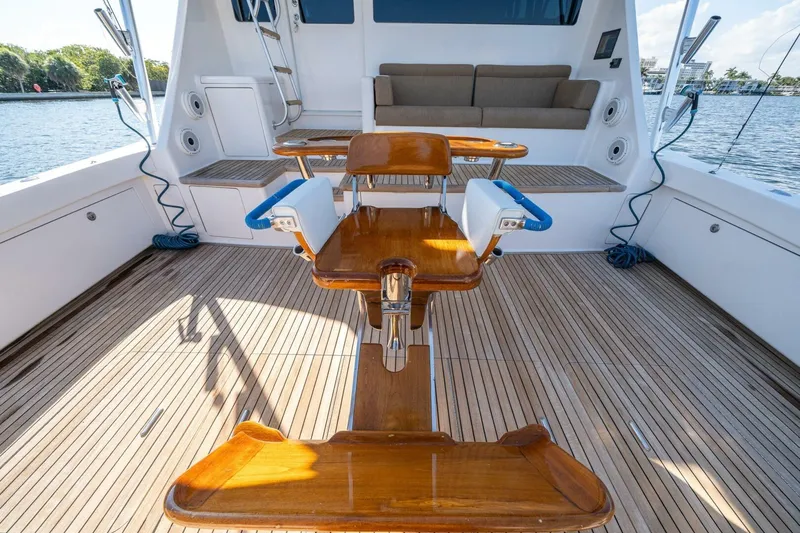 Slide: The Image of 2006 Viking 68 Convertible yacht deck with fishing chair and seating area. - 54