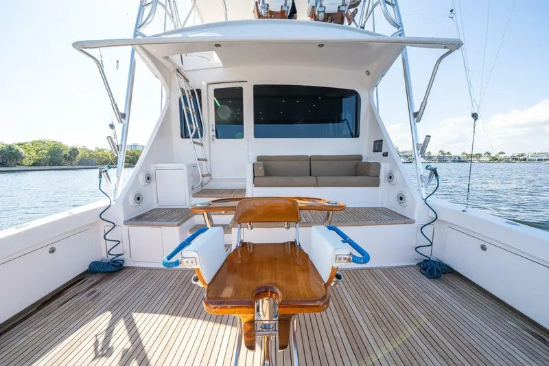 Slide: The Image of 2006 Viking 68 Convertible yacht deck with fishing chair and seating area. - 55